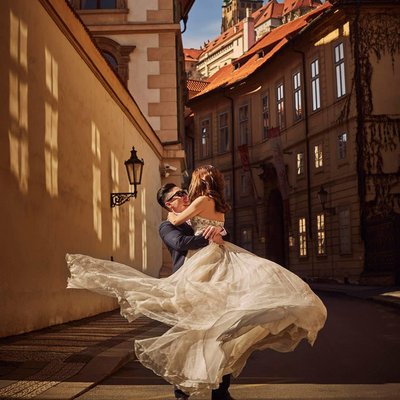 Spinning the bride-to-be under Prague Castle photo