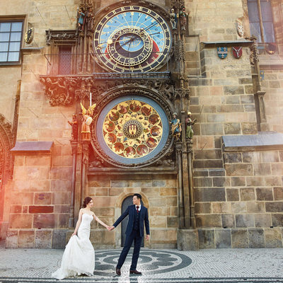 sexy, stylish couple under the Astronomical Clock