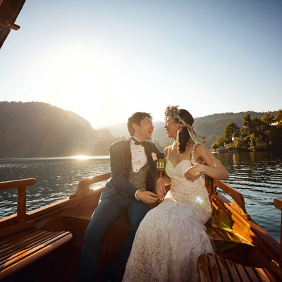 wedding couple enjoying boat ride Lake Bled