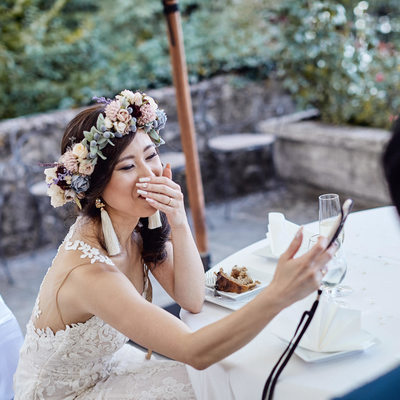 Laughing bride enjoying her selfie