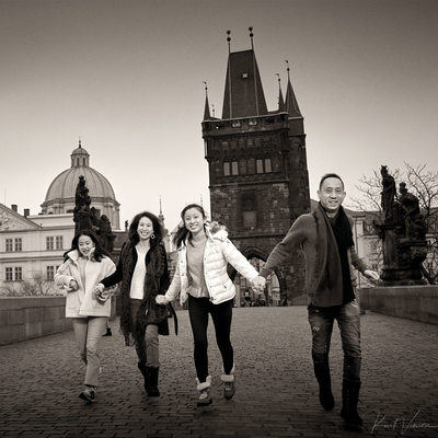 reportage family styled portraits Prague Charles Bridge