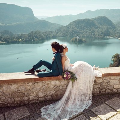 T&S enjoying view overlooking Lake Bled on wedding day