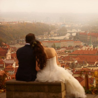 wedding couple enjoy romantic view above Prague