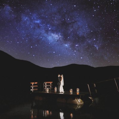 bride & groom under Milky Way Lake Eibsee Germany