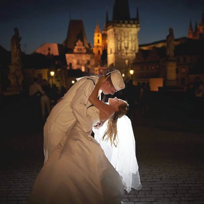 a kiss for his bride under the stars in Prague