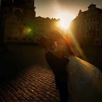 bride & groom experiencing sunrise at Old Town Square