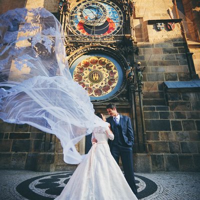 bride & groom underneath the Astronomical Clock