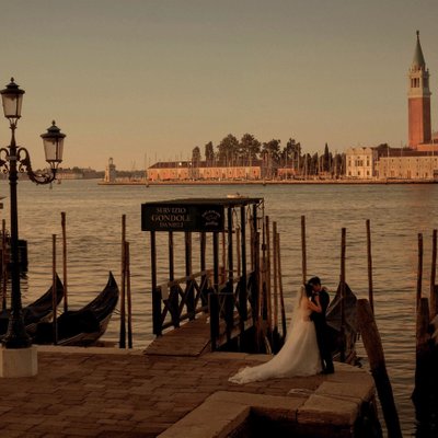 bride & groom at Gondola Danieli Venice love story