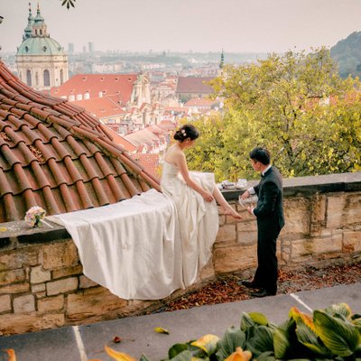 Prague Castle assisting his bride2be with her shoes