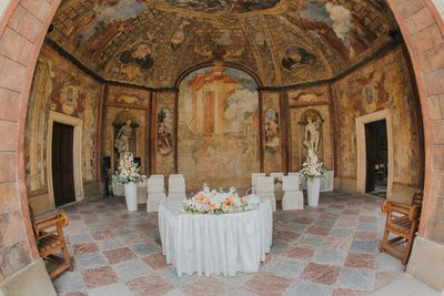 floral set up and table and chairs