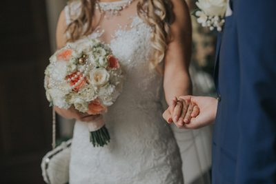 the brides bouquet and her purse 