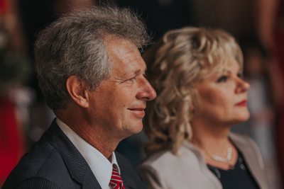 Father of the bride watches his daughter marry