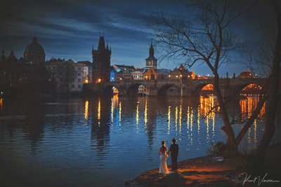 romantic artistic image couple Charles Bridge night