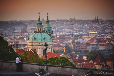 snuggling & looking over St. Nicholas Church in Prague