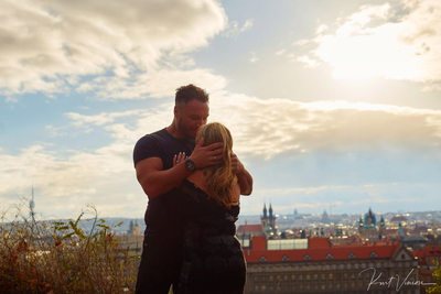 A big hug and kiss for the newly engaged in Prague