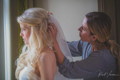 putting on the bride's veil at the Augustine