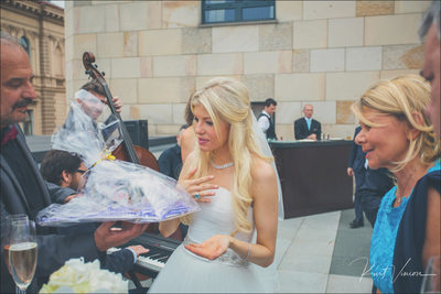 bride reacts to gifts at Four Seasons 