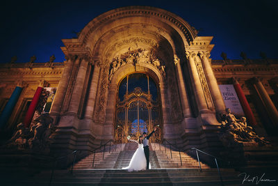 Newlyweds celebrating night Petit Palais Paris 