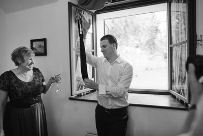 Mother of Groom as he picks out his tie