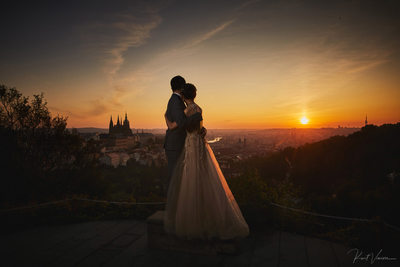 Chinese bride & groom watching sunrise over Prague