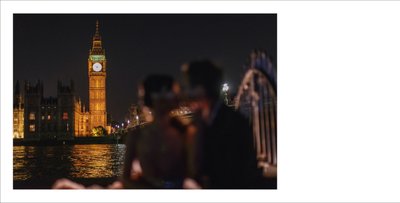 bride & groom kiss silhouetted against Big Ben, London