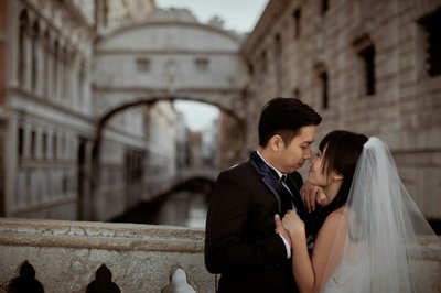 embracing near the Bridge of Sighs 