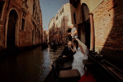 caressing her man in gondola