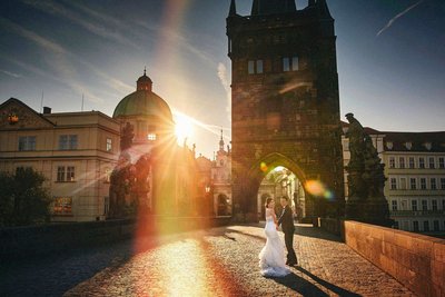 sun flared lovers at Charles Bridge