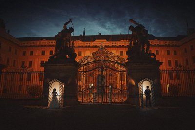 Luxury destination wedding Prague Castle nighttime portrait