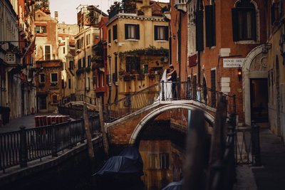 Hong Kong lovers above the canals of Venice 