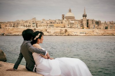 Newlyweds enjoying the view of Valleta Malta
