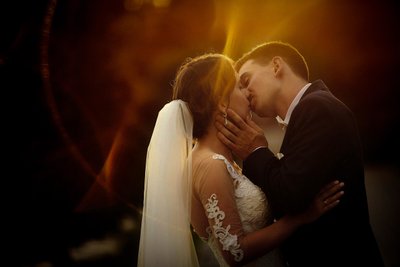 sun-flared kiss - Prague Weddings
