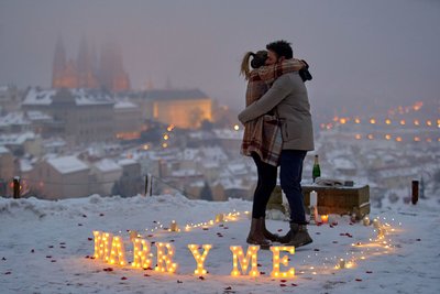Winter Marriage Proposal Fairy Lights Above Prague