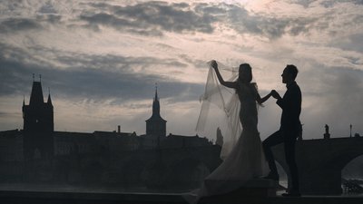 silhouettes against the Prague skyline