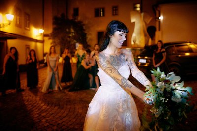 Bride prepares to toss the bouquet