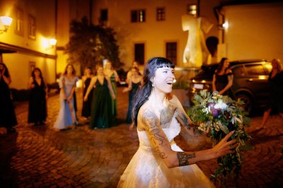 Smiling tattooed bride Augustine