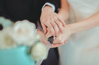 joining hands for cake cutting