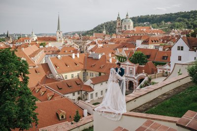 Newlyweds Embrace High Above The Ledebour Garden in Prague