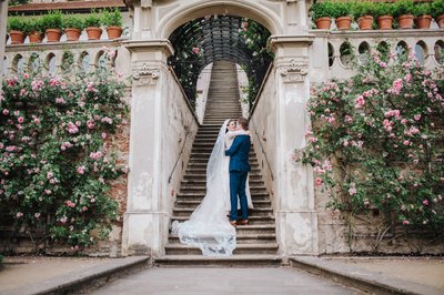 Newlyweds Embrace - Ledebour Garden Luxury Weddings Prague