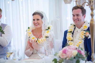 Newlyweds wearing Hawaiian Lei's at Villa Richter