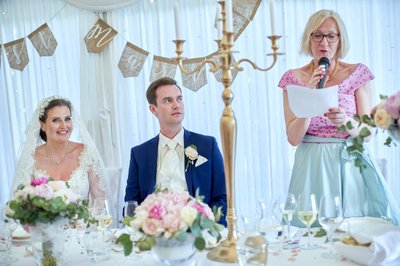 Groom listens to his mother's toast