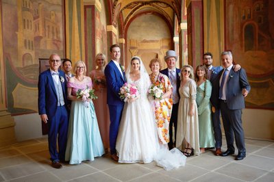 Newlyweds posing with family Prague Ledebour Garden