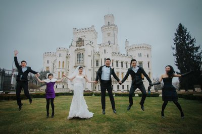 Hong Kong newlyweds and friends jump for joy Castle Hluboka