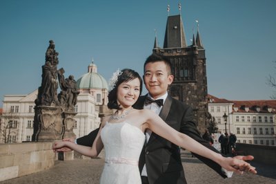 Hong Kong newlyweds Embrace atop Charles Bridge