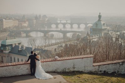 Hong Kong Couple Enjoying Wintertime View of Prague