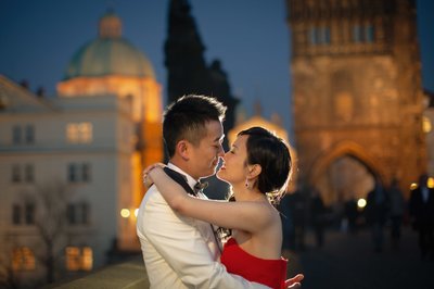 Gorgeous Hong Kong couple enjoying romantic Charles Bridge