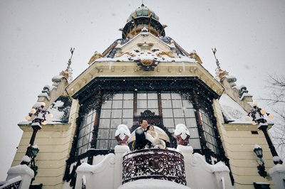 Elegant Hong Kong Couple Enjoying Wintry Scene In Prague