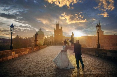 Dancing Newlyweds Atop Charles Bridge at Sunrise