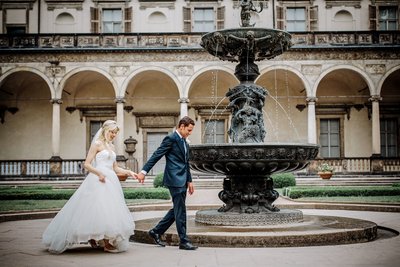 stunning newlyweds touring Belvedere Palace 