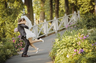 Groom spinning bride